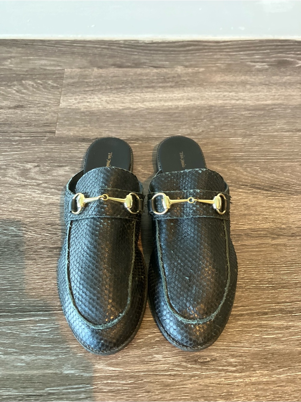 Women's Black Slip-On Loafers with Gold Bit Accent